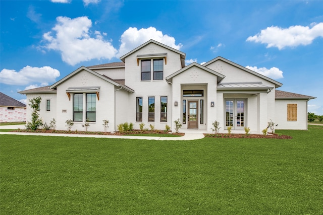 view of front of home featuring a front lawn