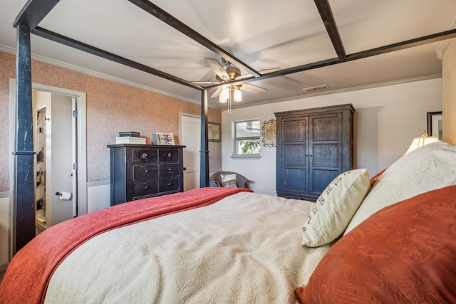 bedroom featuring ceiling fan and crown molding