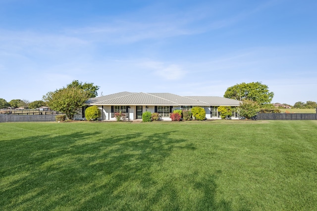 view of front of house with a front lawn