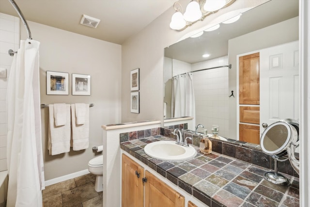 full bathroom featuring vanity, toilet, and shower / tub combo with curtain