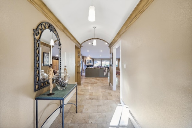 corridor featuring ornamental molding