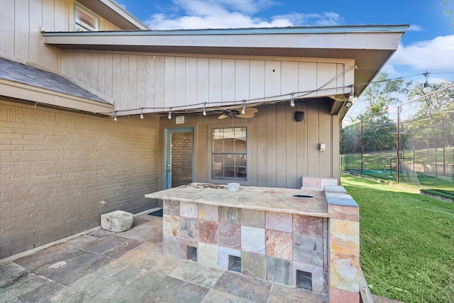 view of patio with ceiling fan