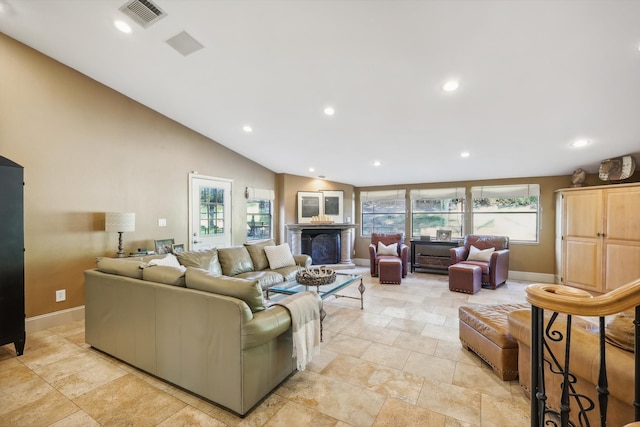 living room with lofted ceiling