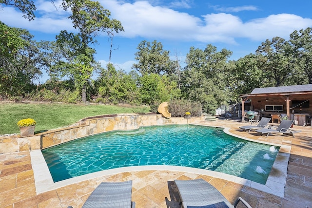 view of pool featuring a patio area