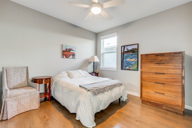 bedroom featuring ceiling fan and hardwood / wood-style floors