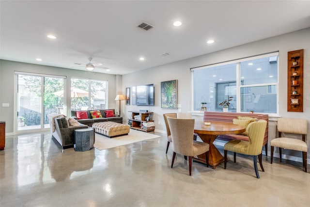 dining room featuring ceiling fan