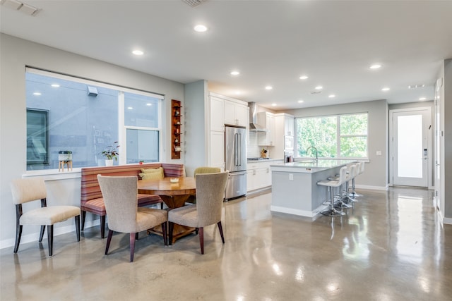 dining room featuring sink