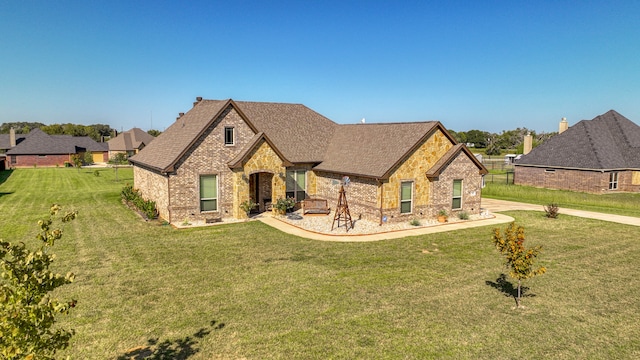 view of front of home featuring a front lawn