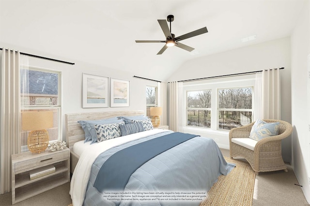 spare room featuring light carpet and ceiling fan