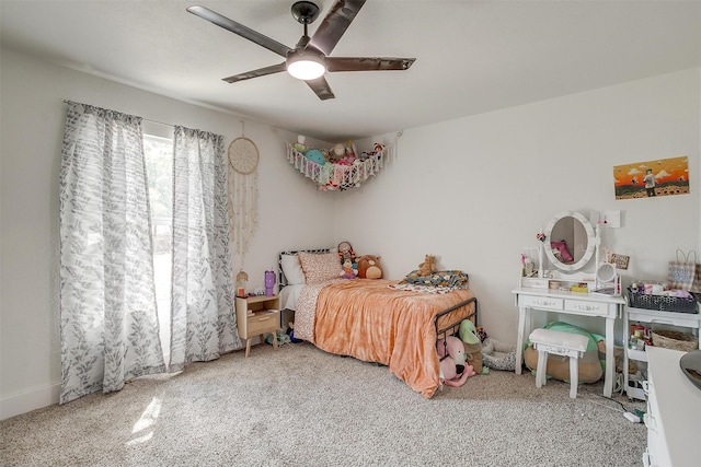 bedroom featuring ceiling fan and carpet floors