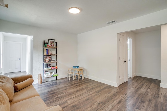 unfurnished room with dark hardwood / wood-style floors