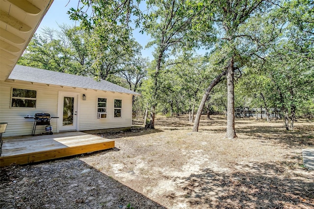 view of yard featuring a deck