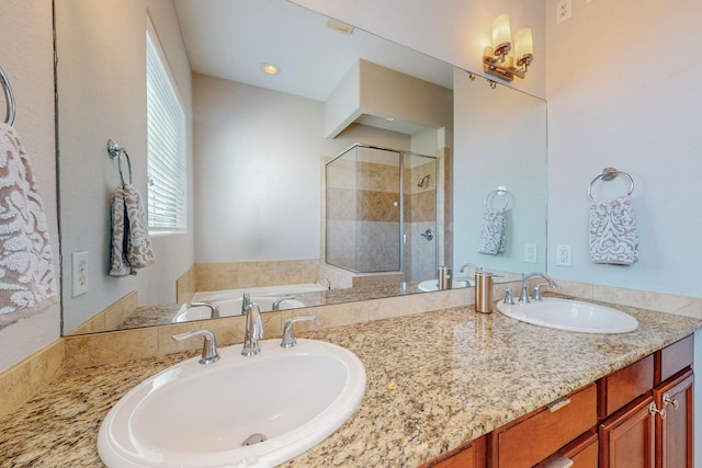 bathroom with vanity and an enclosed shower