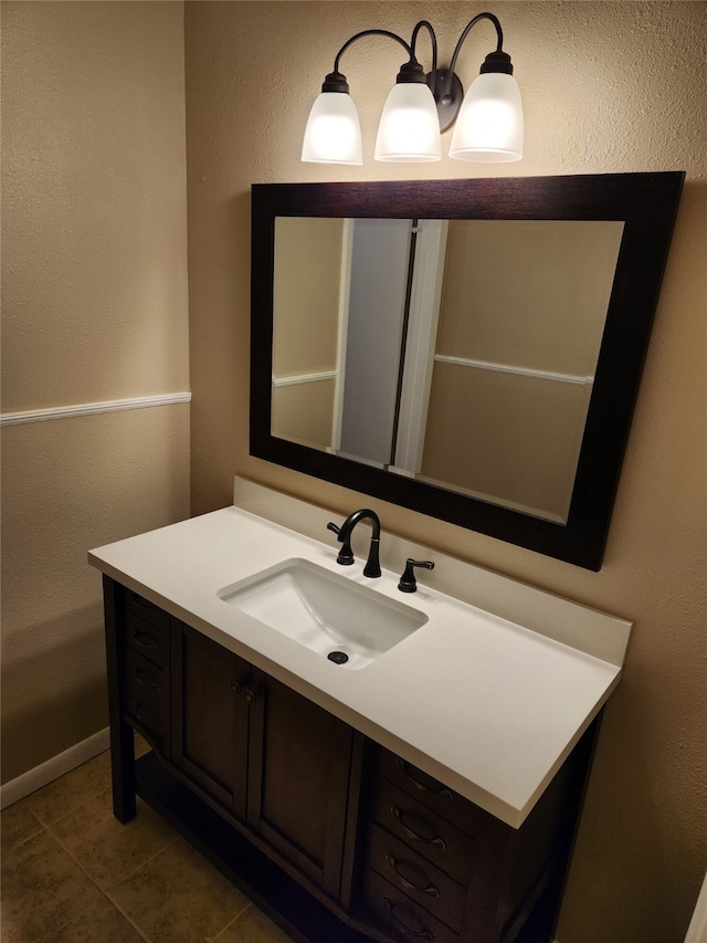 bathroom featuring vanity and tile patterned flooring