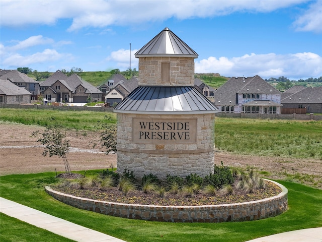 view of community sign