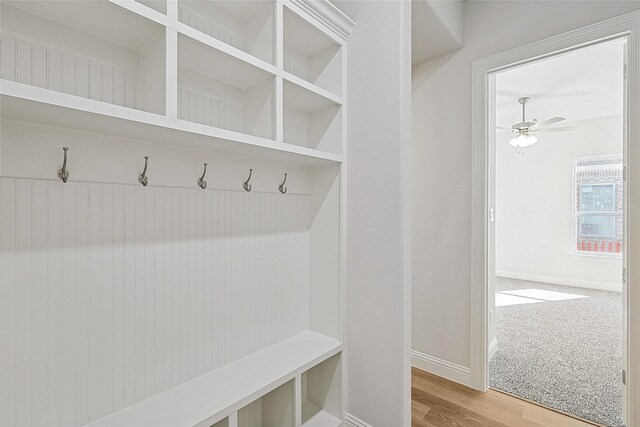 mudroom featuring ceiling fan and hardwood / wood-style floors