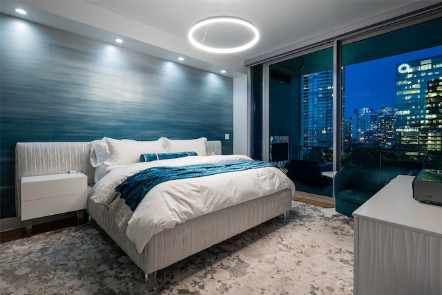 bedroom with floor to ceiling windows