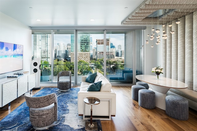 living room with wood-type flooring and a wealth of natural light