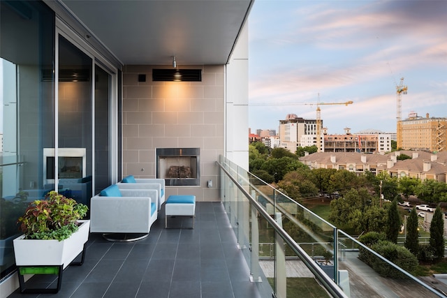 view of balcony at dusk