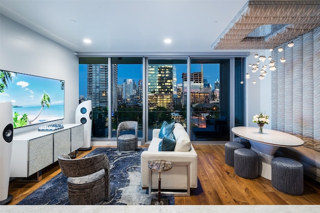 living room featuring hardwood / wood-style flooring and floor to ceiling windows