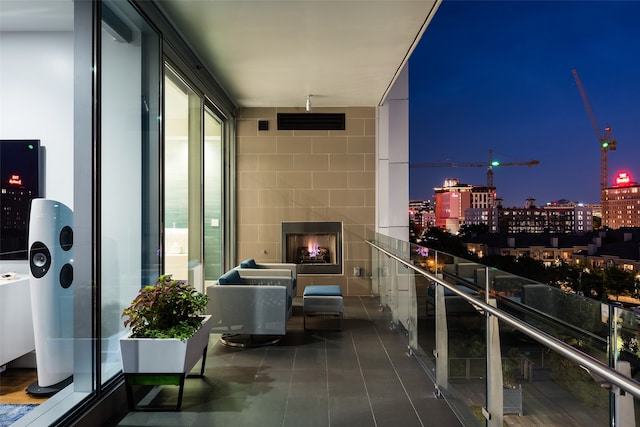 view of balcony at twilight