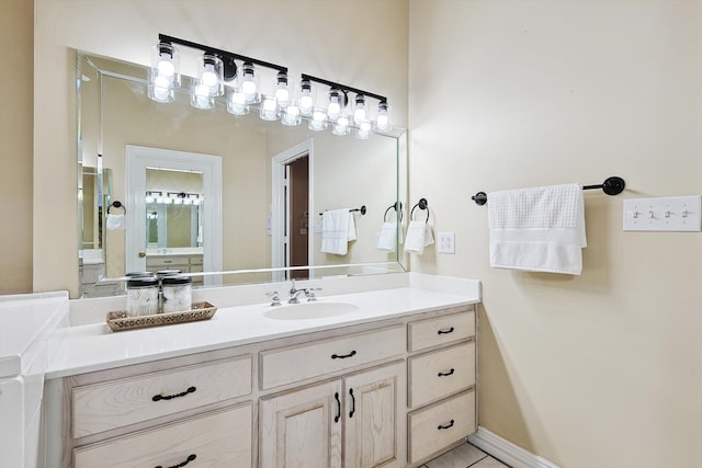 bathroom featuring vanity and tile patterned flooring