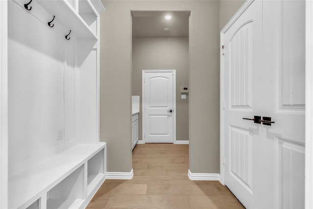 mudroom with light wood-type flooring