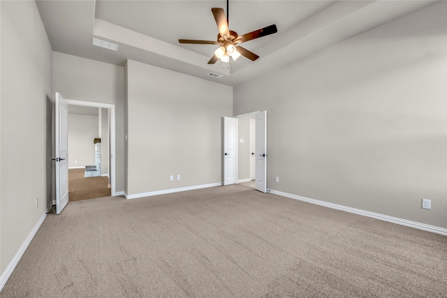 unfurnished bedroom with ceiling fan and light carpet