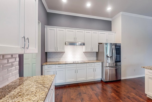 kitchen featuring white cabinets, stainless steel fridge, dark hardwood / wood-style floors, and crown molding