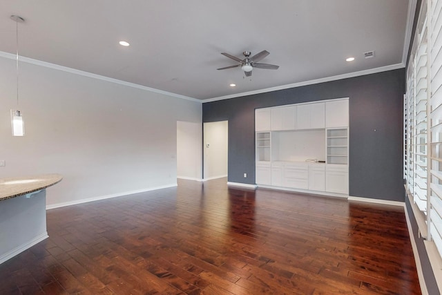 unfurnished living room with ornamental molding, dark hardwood / wood-style flooring, and ceiling fan