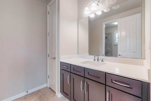 bathroom featuring tile patterned floors and vanity