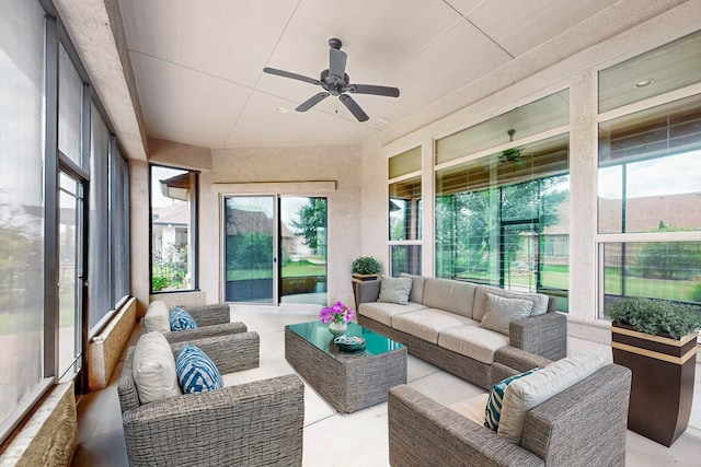 sunroom / solarium with ceiling fan