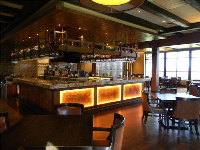 bar featuring hardwood / wood-style flooring