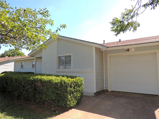 exterior space with a garage