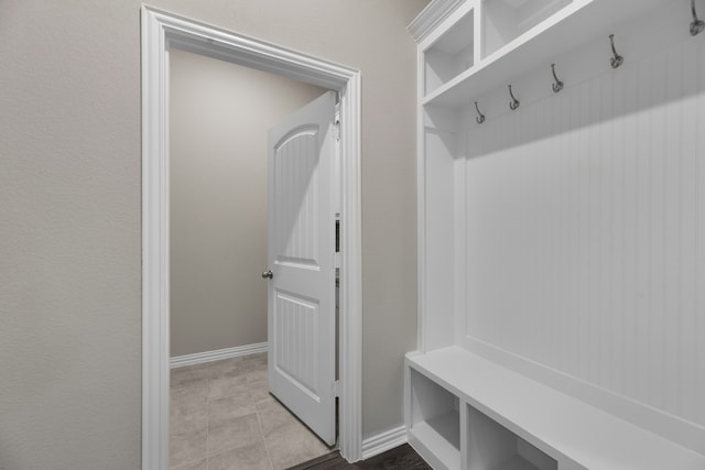 mudroom featuring light tile patterned flooring