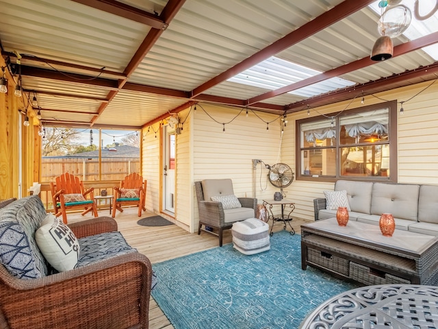 sunroom / solarium with beam ceiling