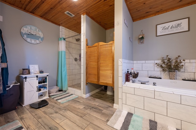 bathroom featuring wood-type flooring, separate shower and tub, and wood ceiling