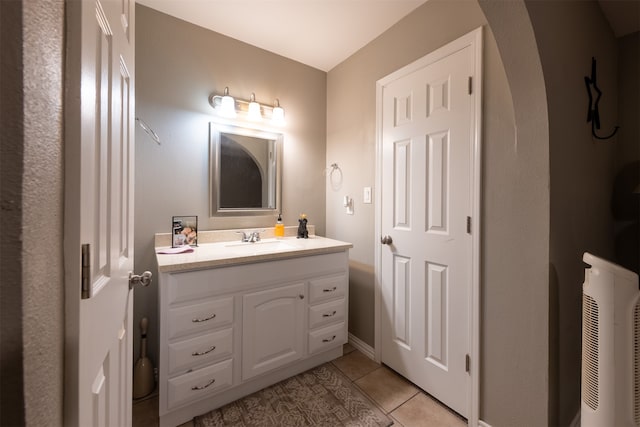 bathroom with vanity and tile patterned flooring