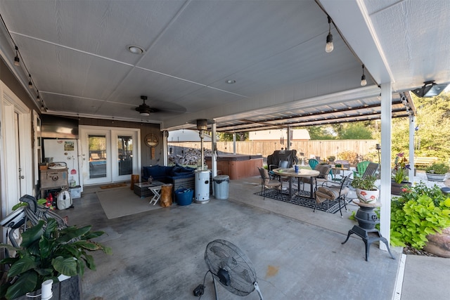 view of patio / terrace featuring ceiling fan