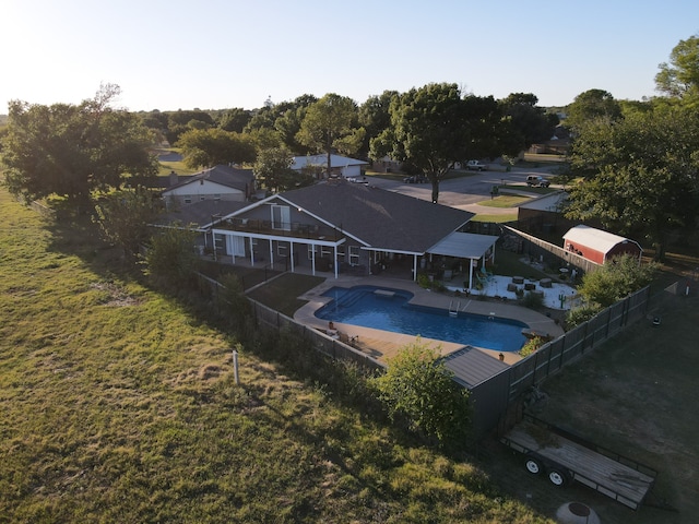 view of pool featuring an outdoor structure and a patio area