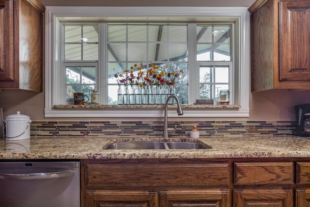 5903 Crowley Rd, Edgecliff Village, TX 76134 - kitchen featuring stainless steel dishwasher, a sink, decorative backsplash, and light stone countertops