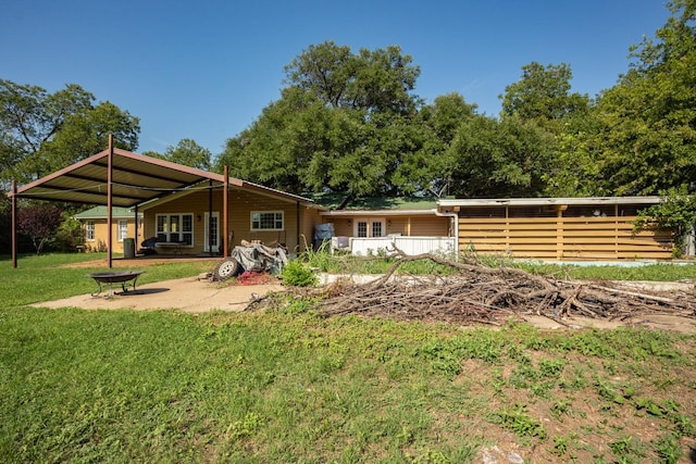 5903 Crowley Rd, Edgecliff Village, TX 76134 - rear view of house with a yard