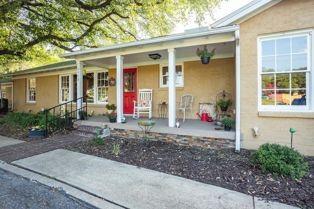 entrance to property with covered porch