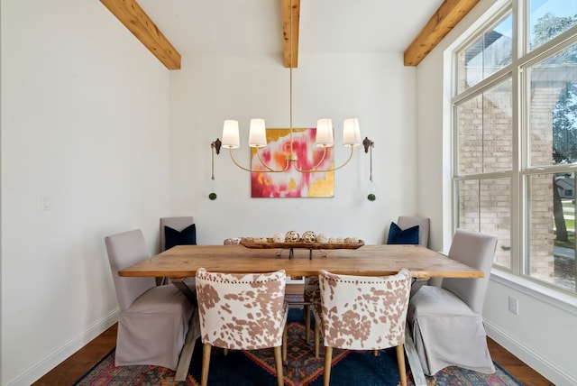 dining space with an inviting chandelier, beamed ceiling, and hardwood / wood-style flooring