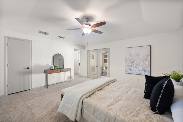 bedroom featuring ceiling fan and light colored carpet