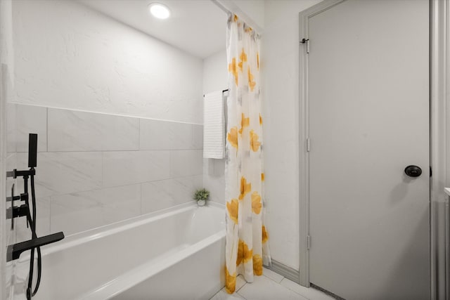 bathroom featuring shower / tub combo with curtain