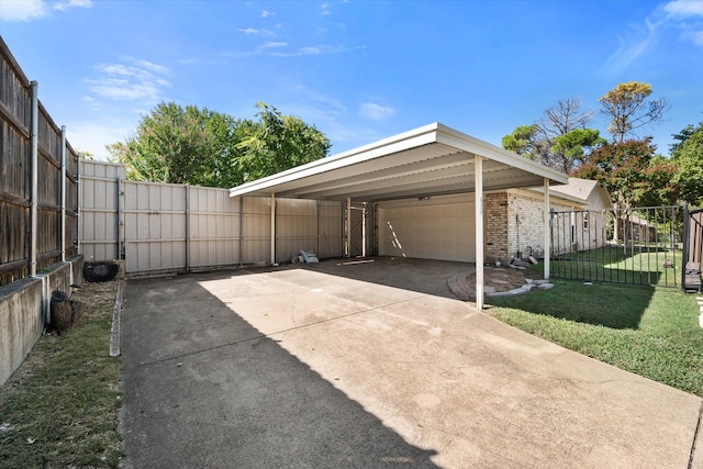 garage featuring a lawn