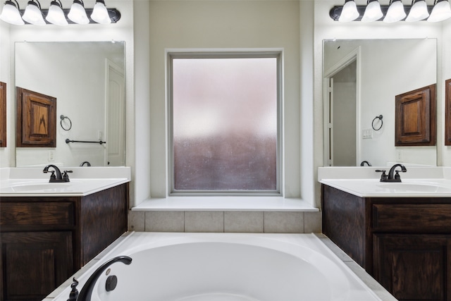 bathroom featuring vanity and a bathing tub