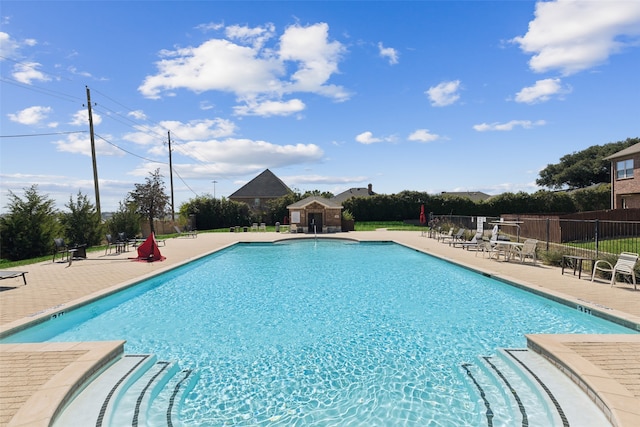 view of pool featuring a patio