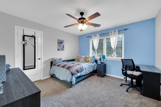 carpeted bedroom featuring ceiling fan